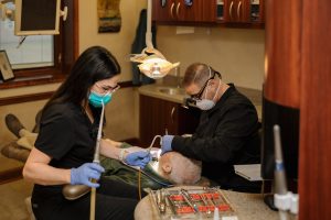 Serenity Advanced Dentistry dentists performing dental treatments