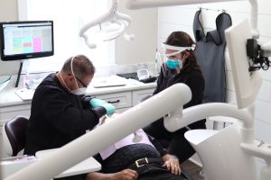 Serenity Advanced Dentistry dentists performing treatments